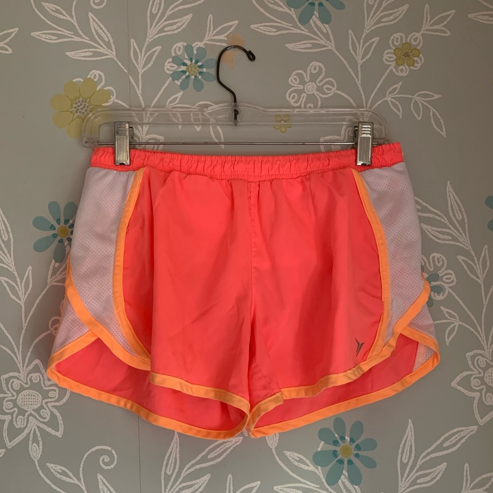 Pink workout shorts.